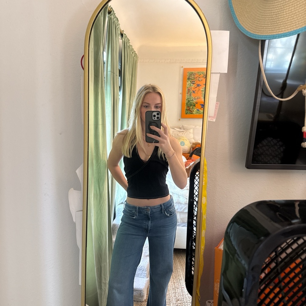 Stylish Black Top with Blue Jeans